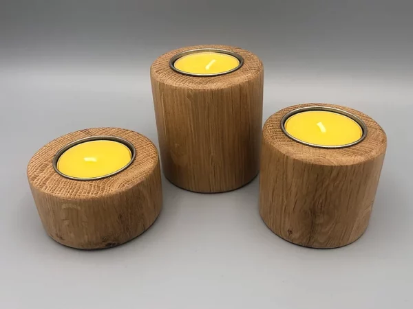 Three handmade wooden candle holders